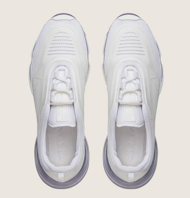 Bílé dámské tenisky Prada nazvané Cloudbust Air Technical Fabric sneakers.